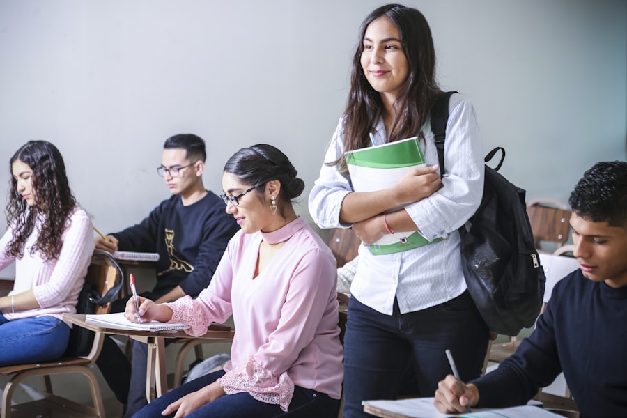 Teen student smiling while holding school books